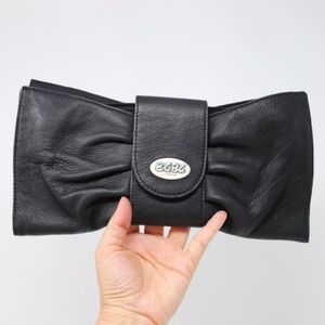 BCBG black leather clutch,  bow shaped, zip closure - BCBG Paris 11.5 x 6
